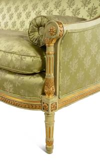 A Louis XVI Style Painted and Parcel Gilt Settee