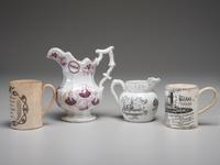 Two Commemorative Creamware Pitchers and Two Ale Mugs