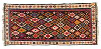 A Kuba Kilim Wool Rug 10 feet 8 inches x 5 feet 4 inches. — CIRCA 1900
