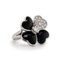 VAN CLEEF & ARPELS, DIAMOND, ONYX AND WHITE GOLD 'COSMOS' RING