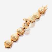A fourteen karat gold and diamond bracelet watch, J. Schulz