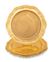 A Set of Eight Gilt Silver-Plate Chargers