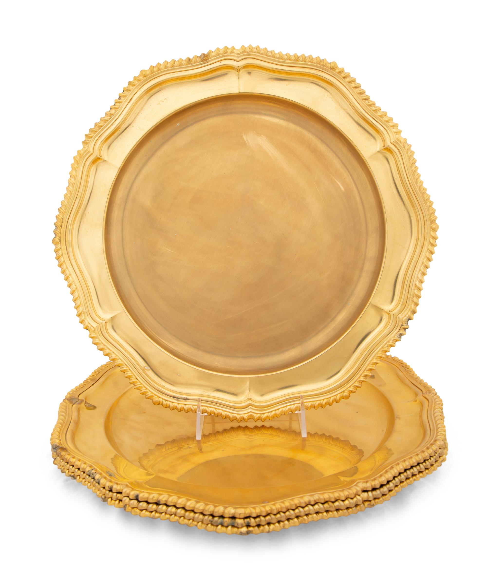 A Set of Eight Gilt Silver-Plate Chargers