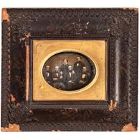 [EARLY PHOTOGRAPHY - PORTRAITURE]. A pair of half plate daguerreotype portraits of families housed in wooden wall frames, comprising: