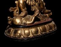 A Large Sino-Tibetan Gilt and Red Lacquered Wood Figure of a Mahākāla