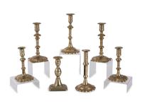 Seven English Brass Candlesticks