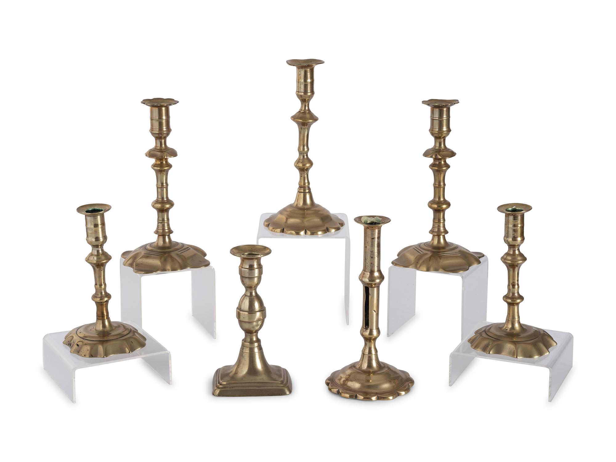 Seven English Brass Candlesticks