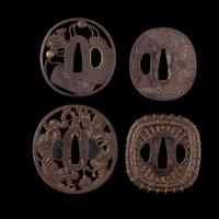 Four Japanese Inlaid Cast Iron Tsuba