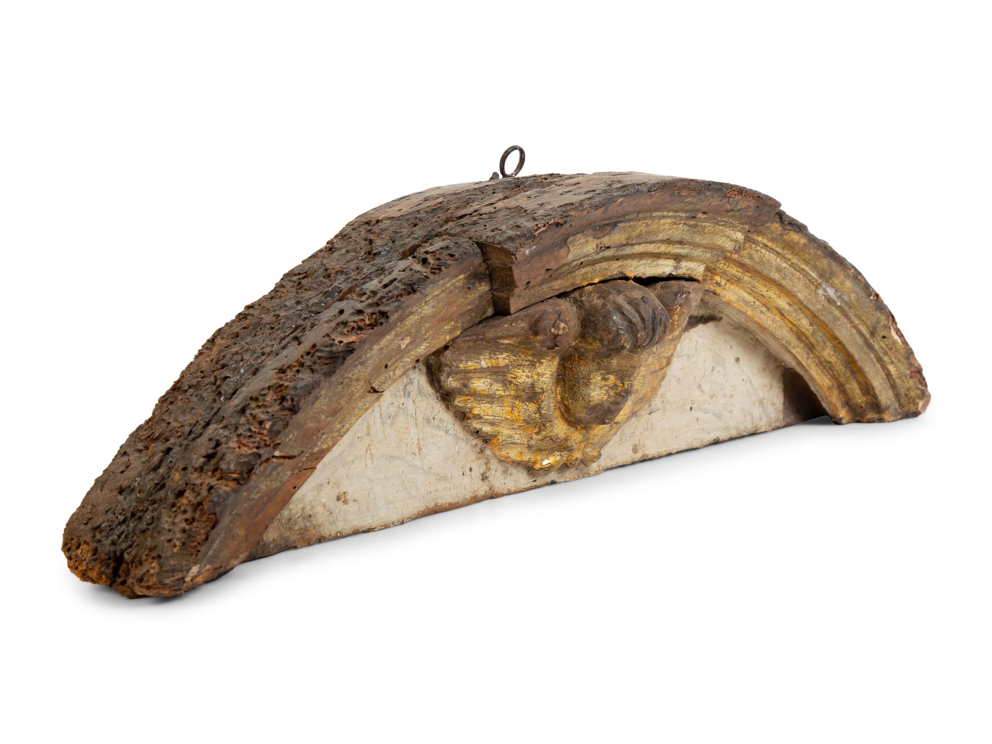 A Florentine Carved and Parcel Gilt Pediment — 17TH CENTURY