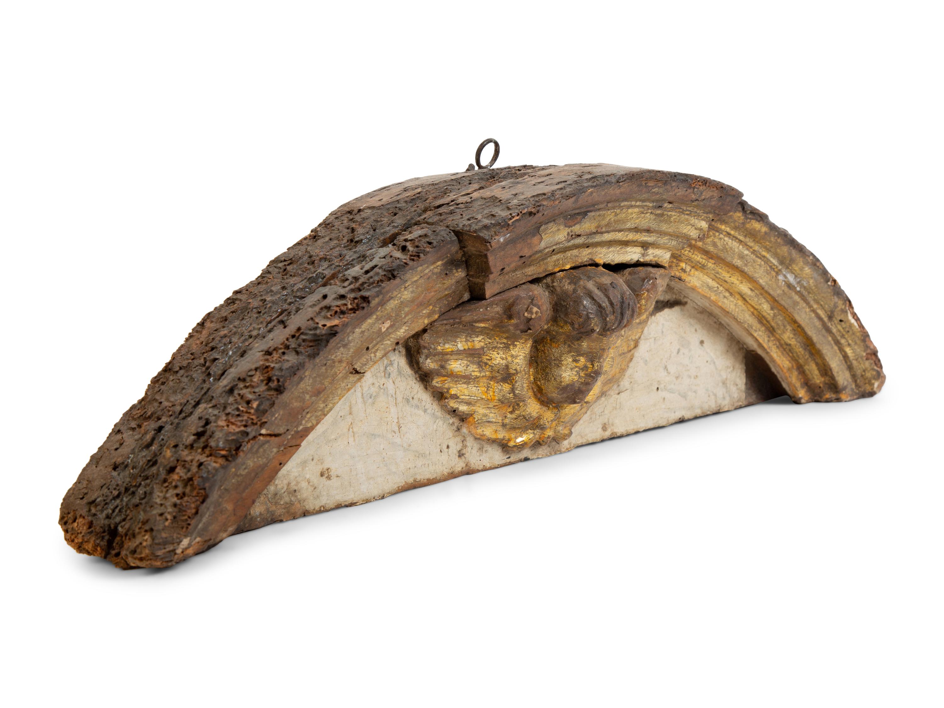 A Florentine Carved and Parcel Gilt Pediment — 17TH CENTURY