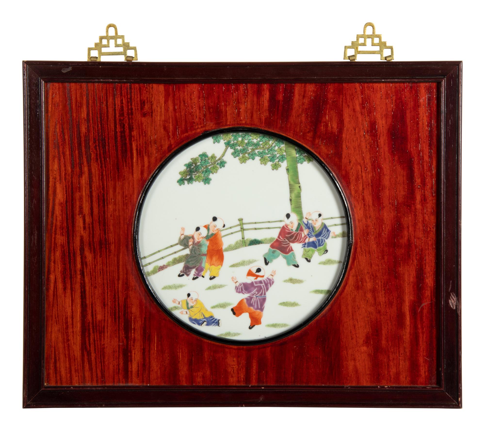 A Set of Four Chinese Famille Rose Porcelain Inset Hardwood Wall Panels
