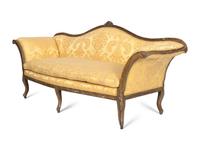 An Italian Rococo Silvered and Gilt Walnut Sofa