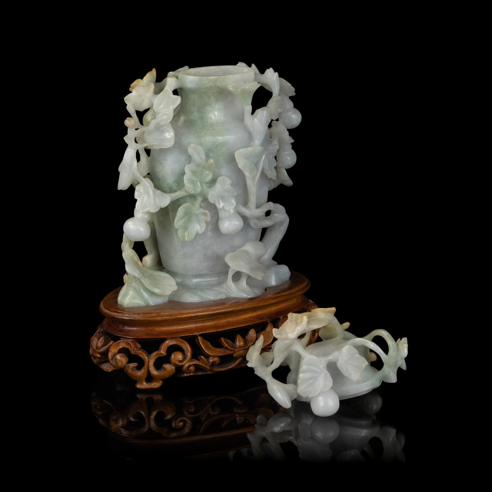 A Chinese Carved Openwork Jadeite Vase and Cover, Qing Dynasty 清 鏤雕翡翠賞瓶