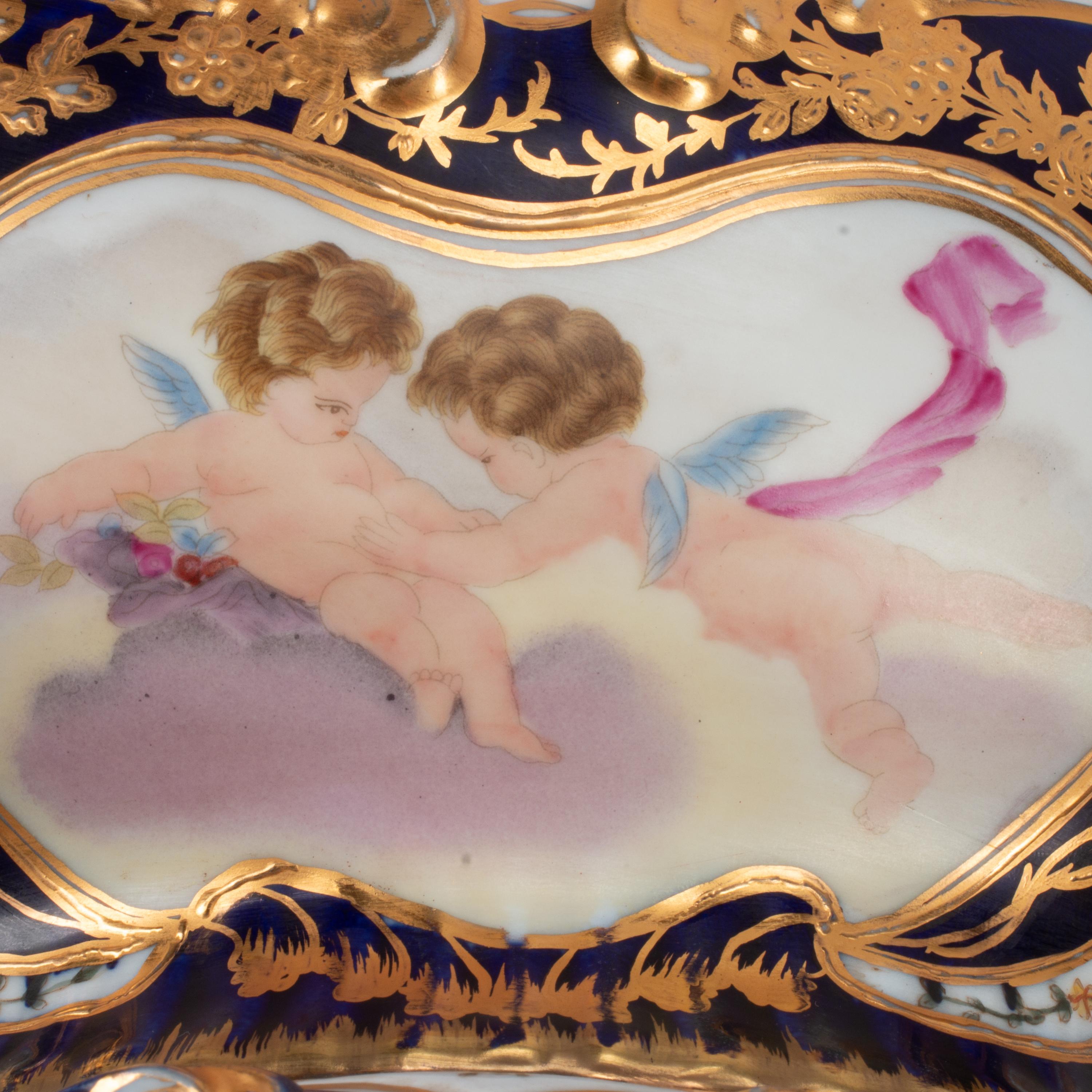 A Pair of Sèvres Style Porcelain Potpourri Vases and Covers