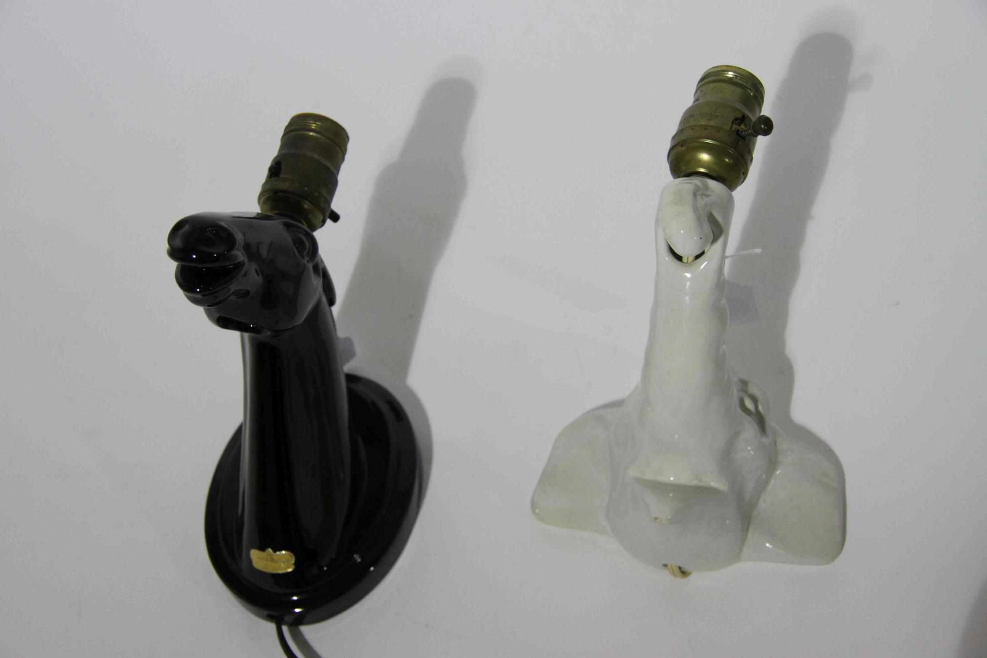 Two Haeger Pottery Figural Sconces Width of widest 9 3/4 inches. — 1947