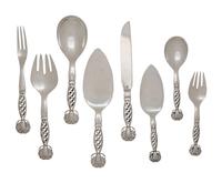 A Group of Eight Georg Jensen Silver Ornamental Serving Articles