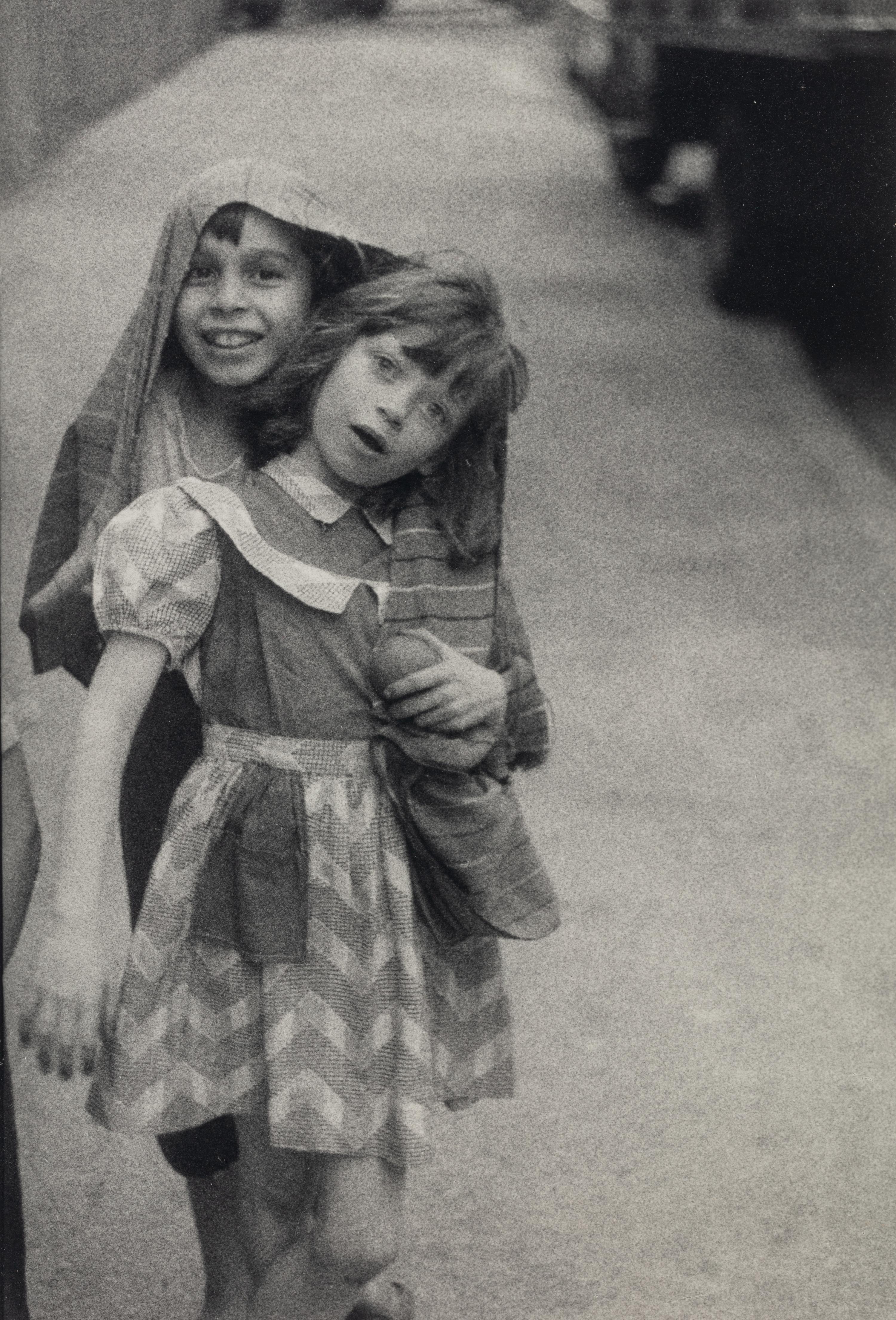 Diane Arbus (1923-1971) Kids in a coat, N.Y.C., 1960