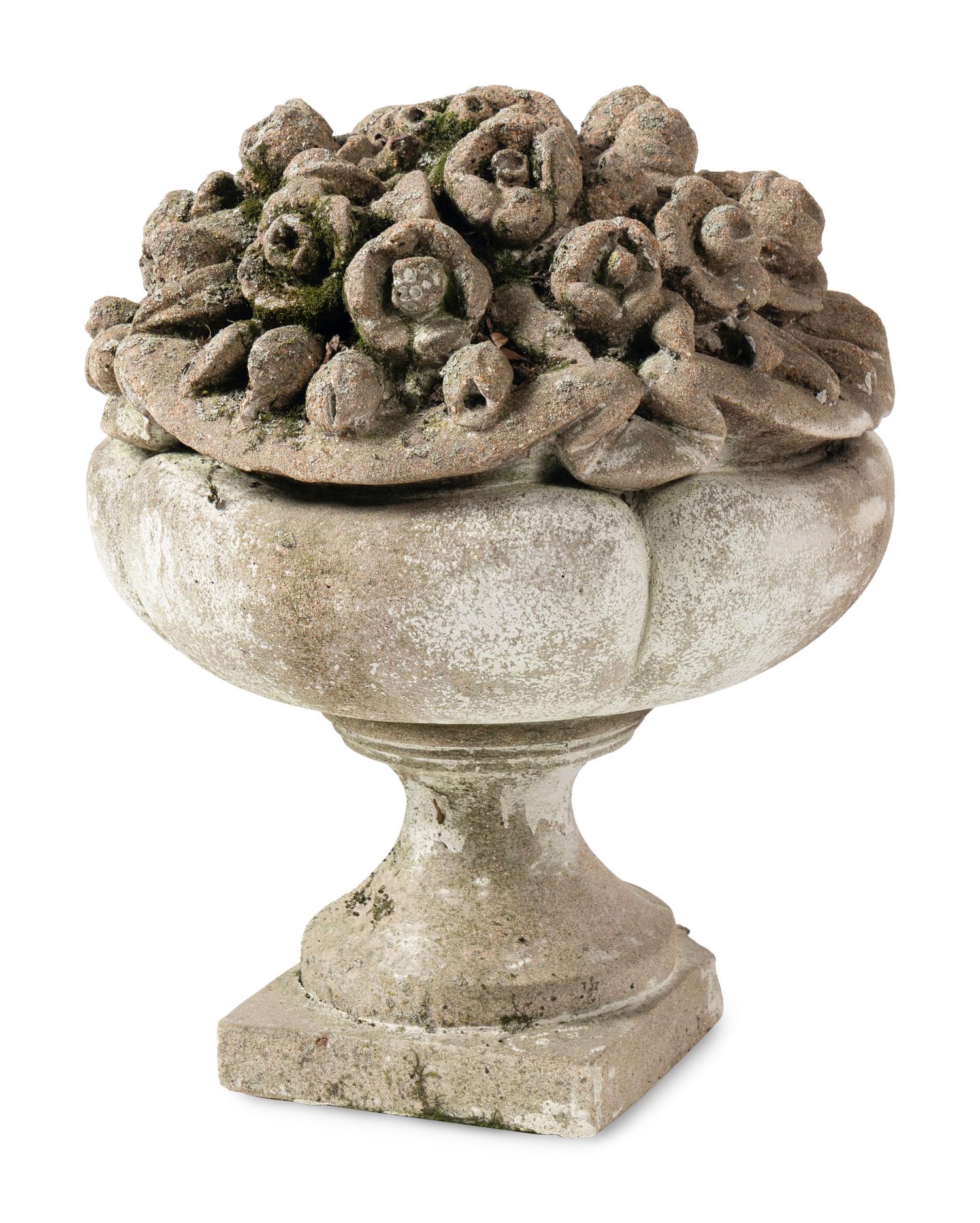 A Pair of Cast Stone Garden Ornaments