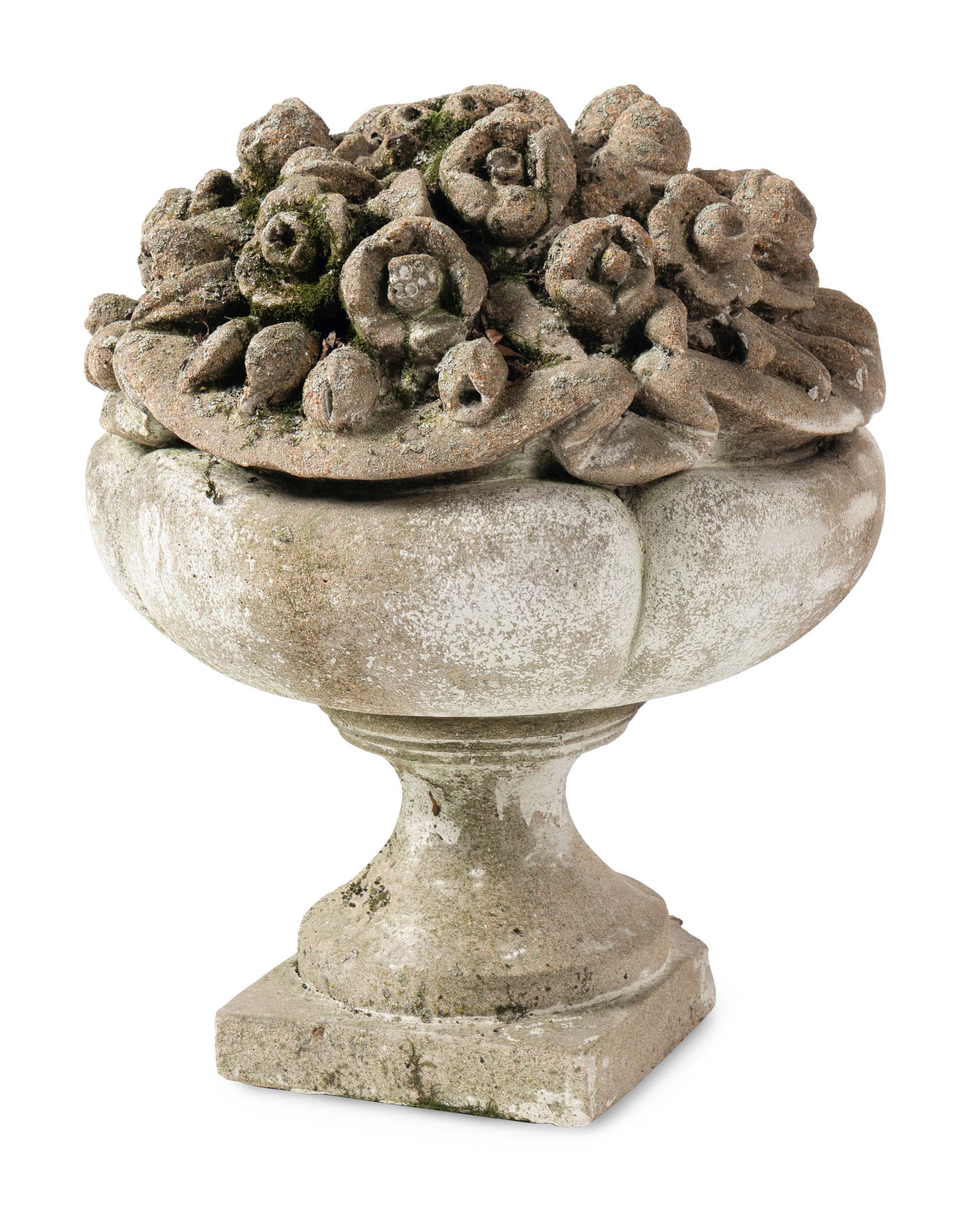 A Pair of Cast Stone Garden Ornaments