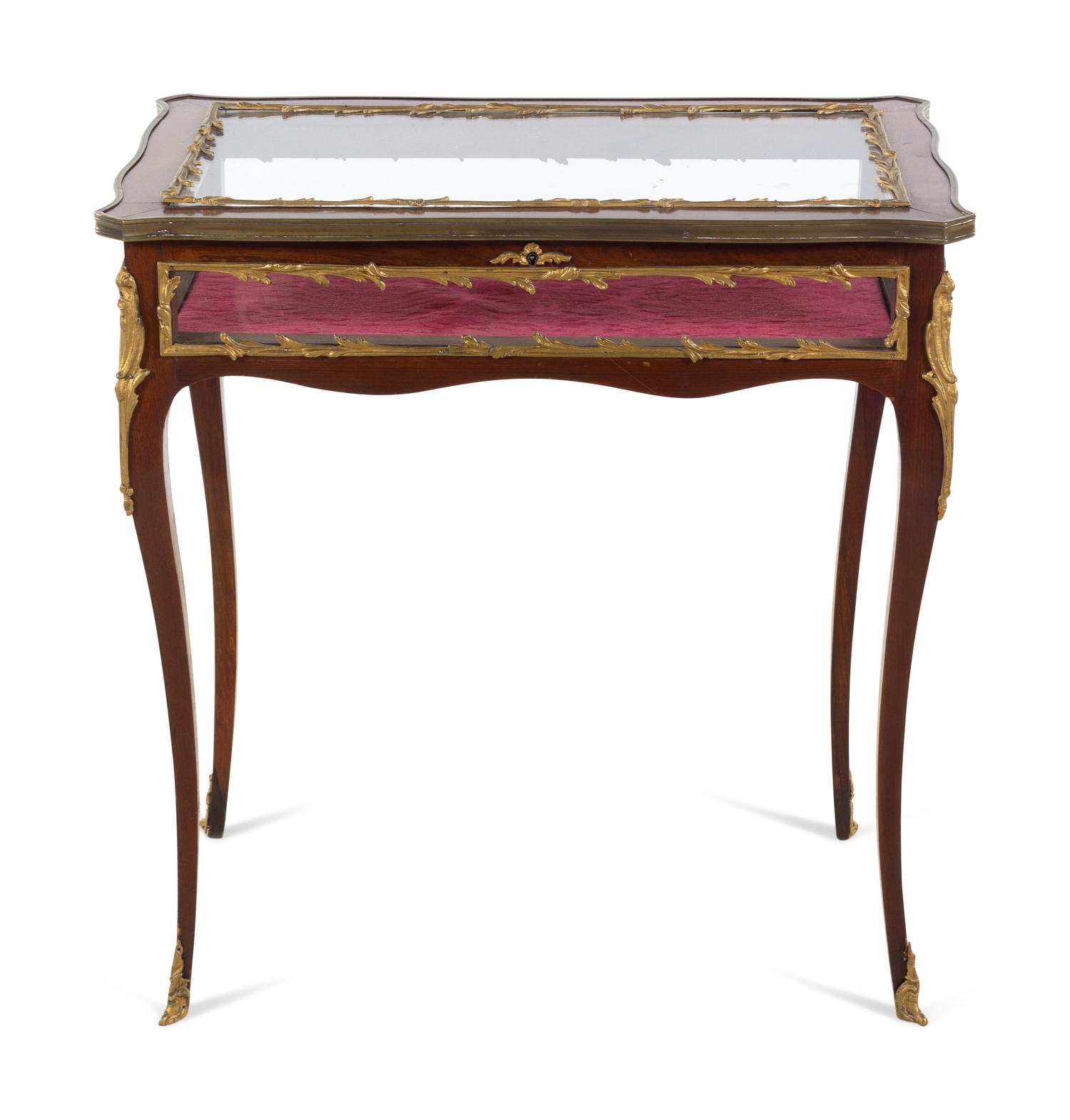 A Louis XV Style Gilt Metal Mounted Mahogany Vitrine Table