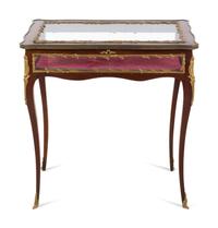 A Louis XV Style Gilt Metal Mounted Mahogany Vitrine Table