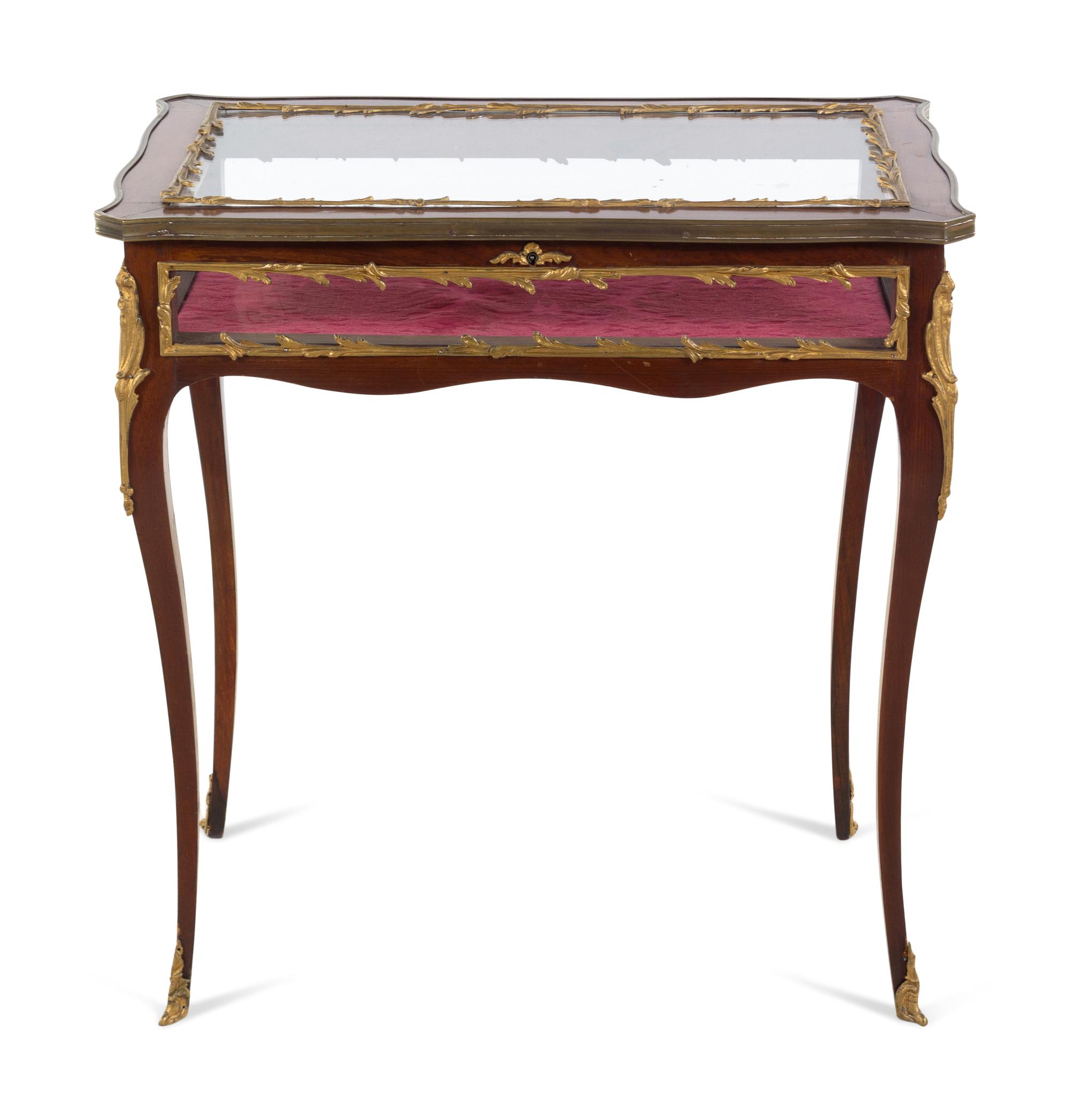 A Louis XV Style Gilt Metal Mounted Mahogany Vitrine Table