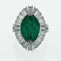 An 18K White Gold, Emerald, and Diamond Ring
