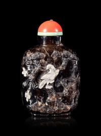 A Carved Smoky Quartz Snuff Bottle