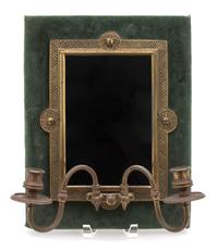 An Ebonized and Gilt Metal Mounted and Mirrored Two-Light Wall Sconce Height 14 x width 11 x depth 6 1/2 inches. — 20TH CENTURY