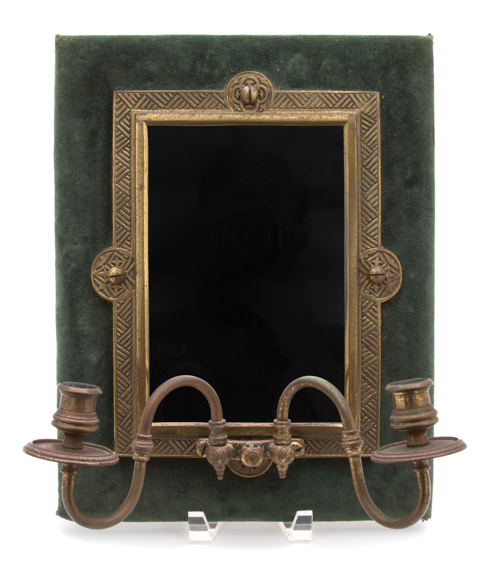 An Ebonized and Gilt Metal Mounted and Mirrored Two-Light Wall Sconce Height 14 x width 11 x depth 6 1/2 inches. — 20TH CENTURY