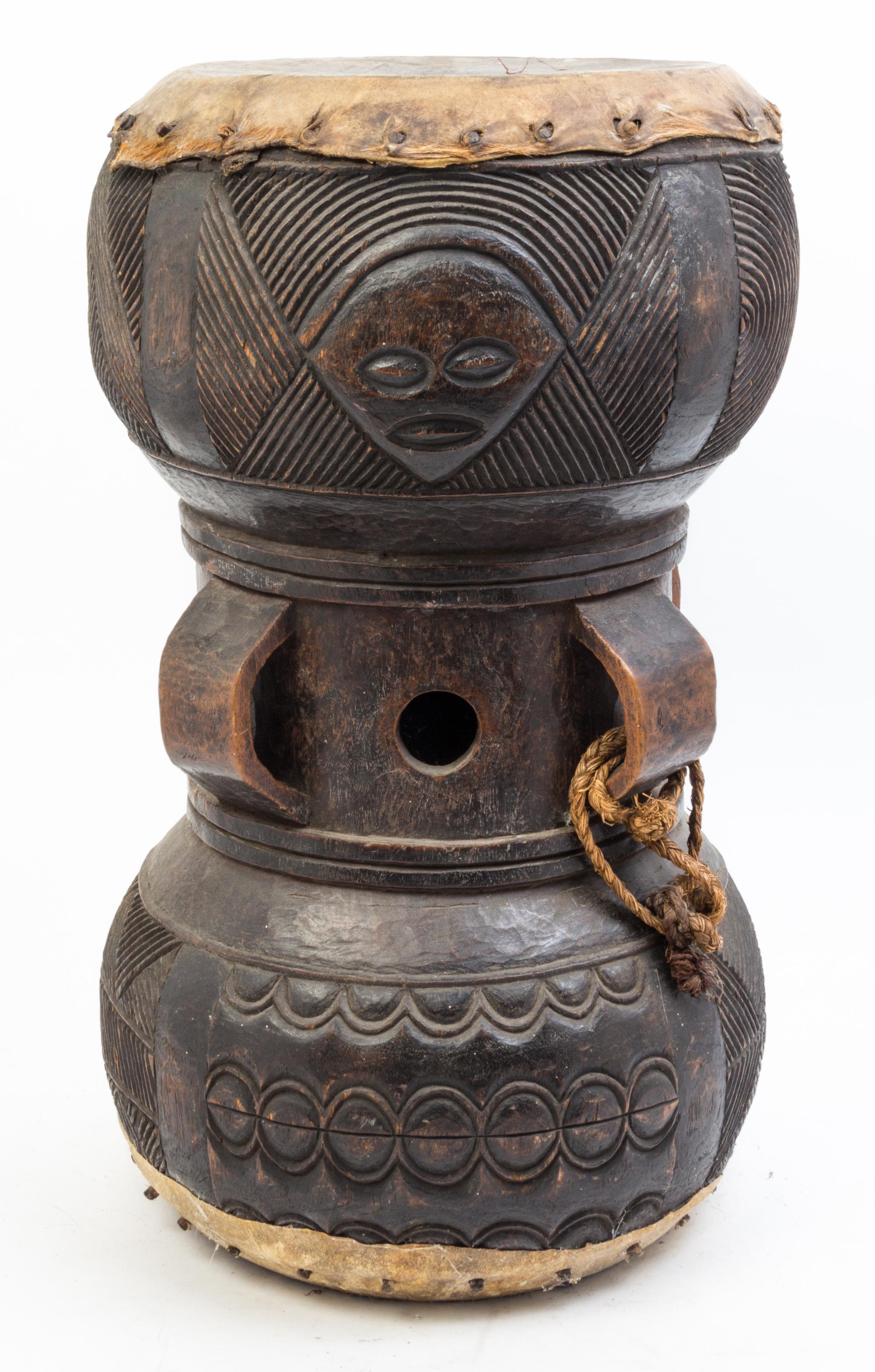A Carved Wood Drum Height 20 inches.