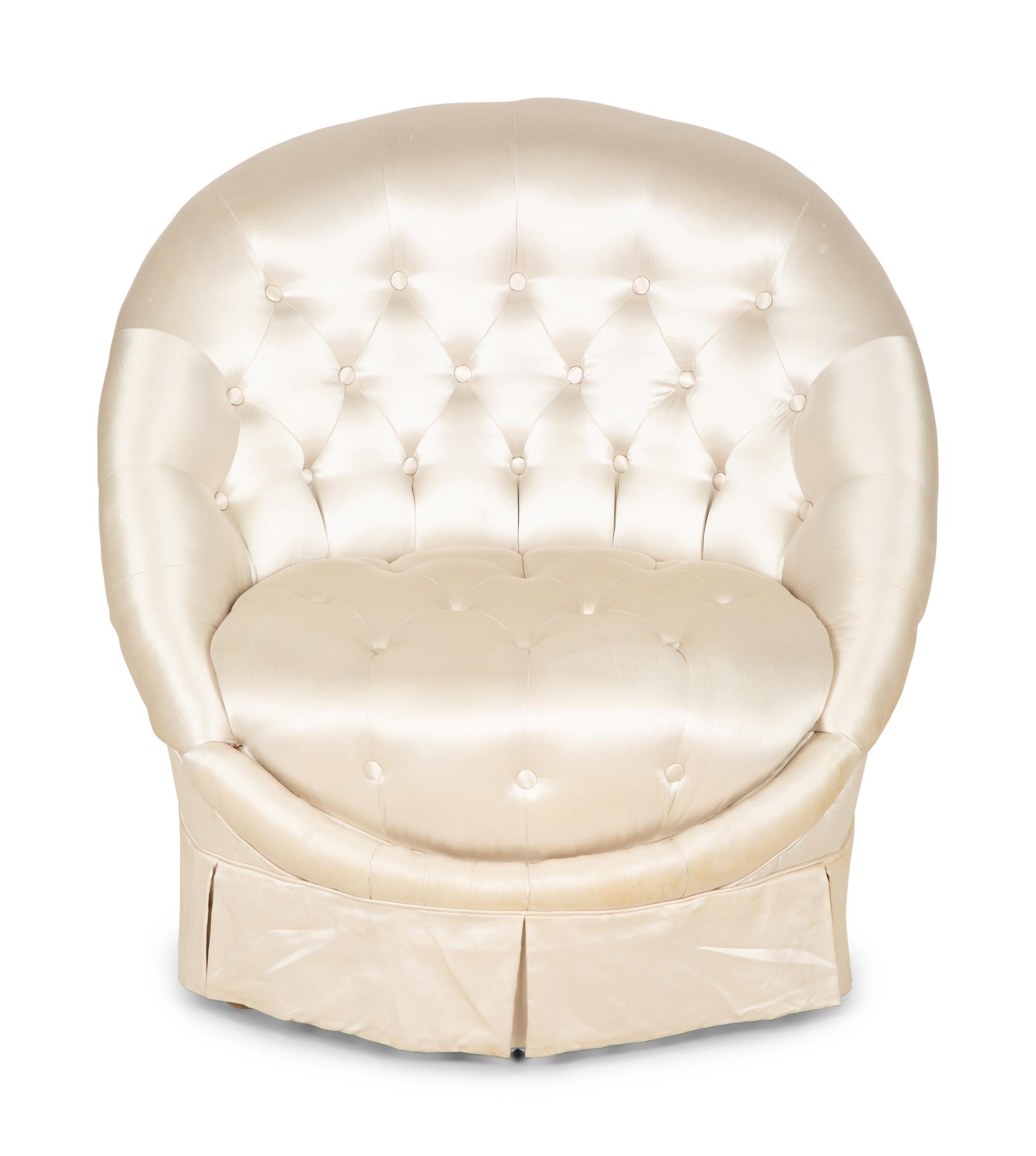A Button-Tufted Silk-Upholstered Skirted Lounge Chair