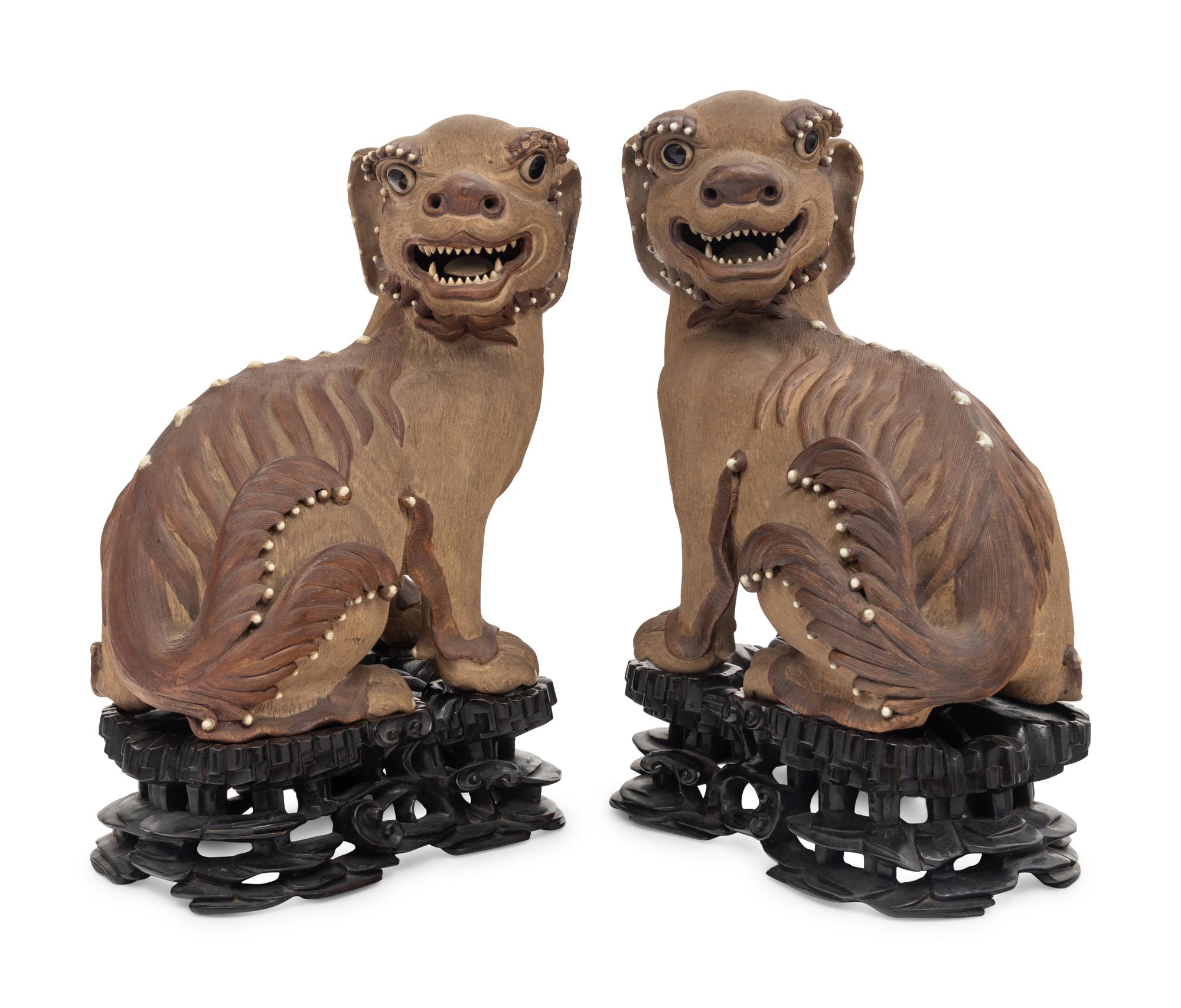 A Pair of Chinese Yixing Zisha Pottery Figures of Fu Lions