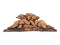 A French Carved Walnut Figural Overdoor Panel