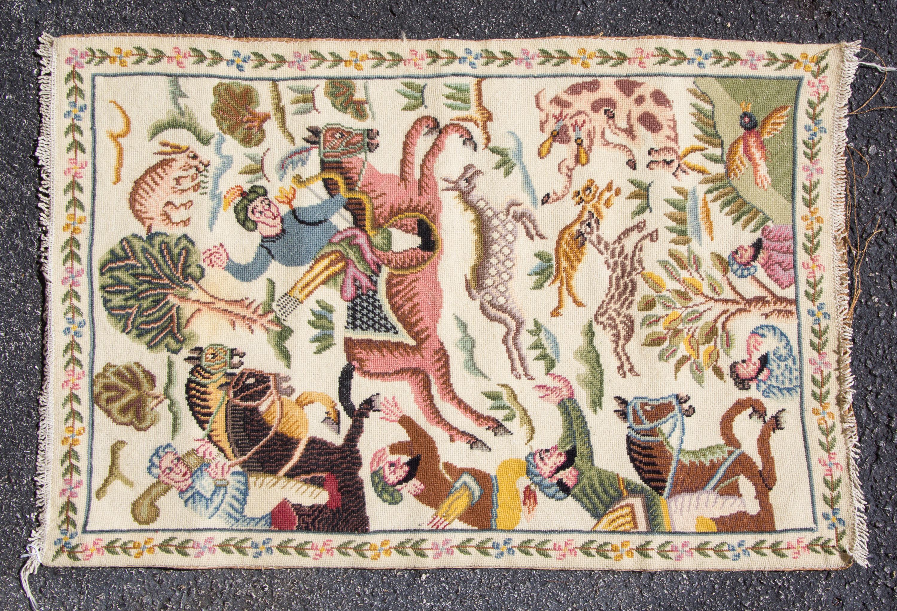 Two Needlepoint Rugs Dimensions of larger 35 x 23 inches. — 20TH CENTURY