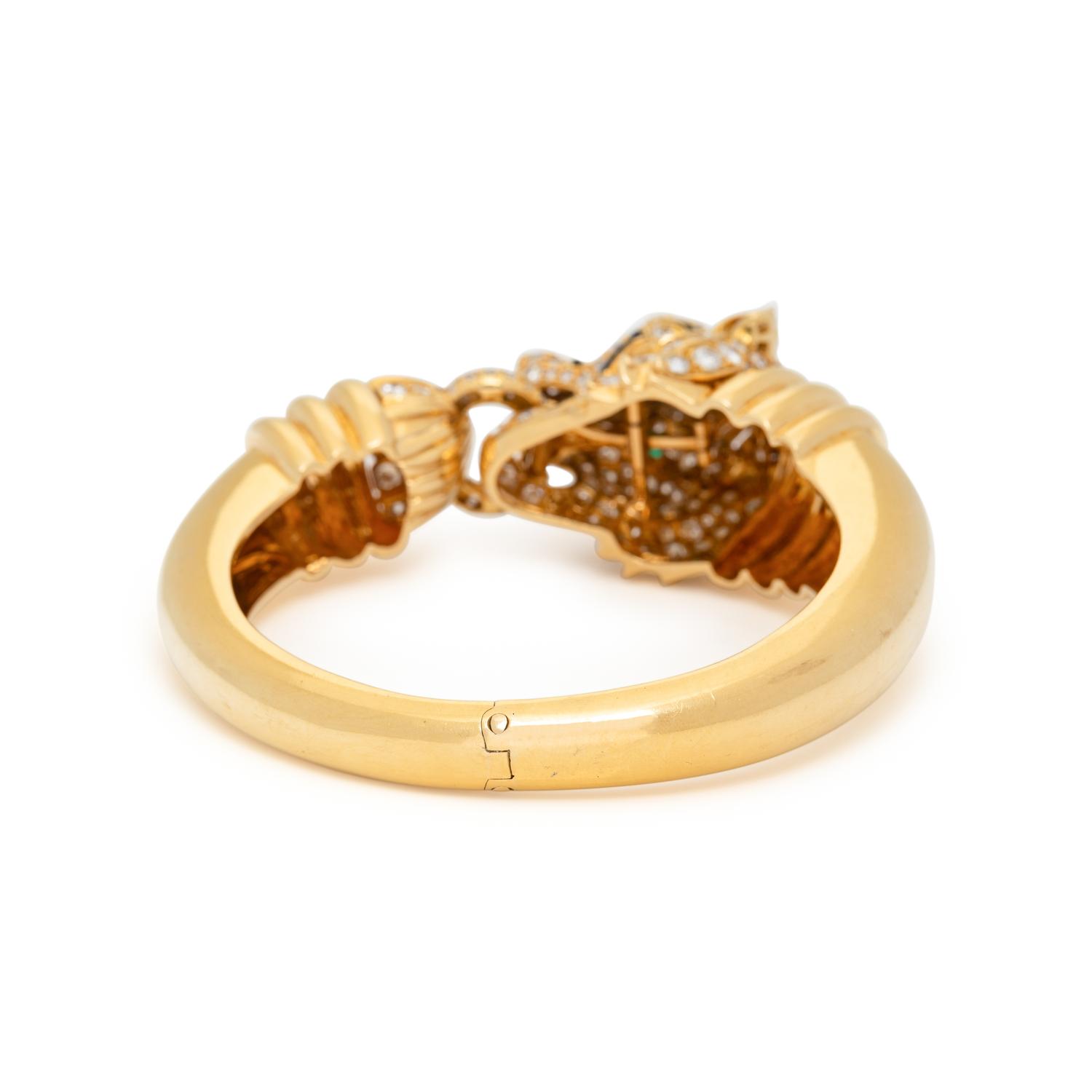 DAVID WEBB, DIAMOND, EMERALD AND ENAMEL TIGER BANGLE BRACELET