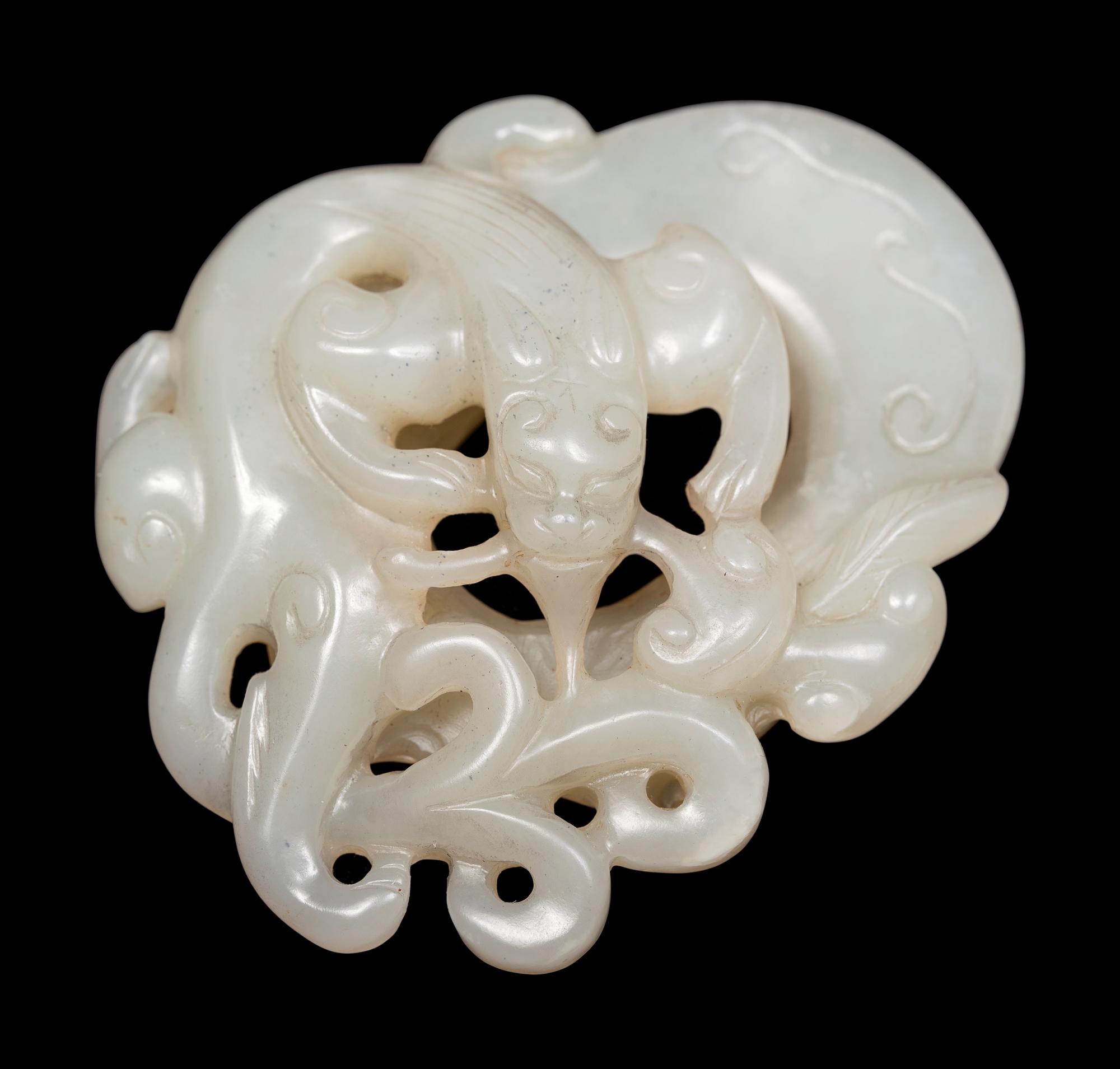 Five Chinese Carved Celadon Jade Pendants