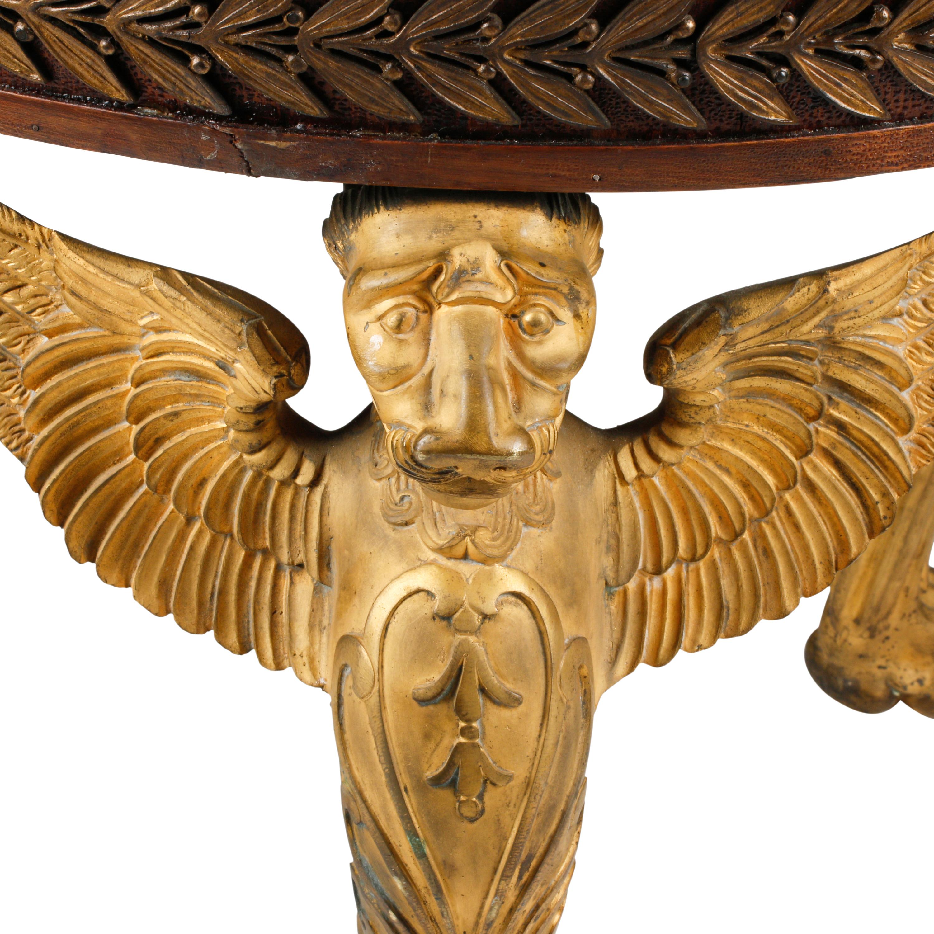 An Empire Gilt Bronze and Mahogany Marble-Top Guéridon
