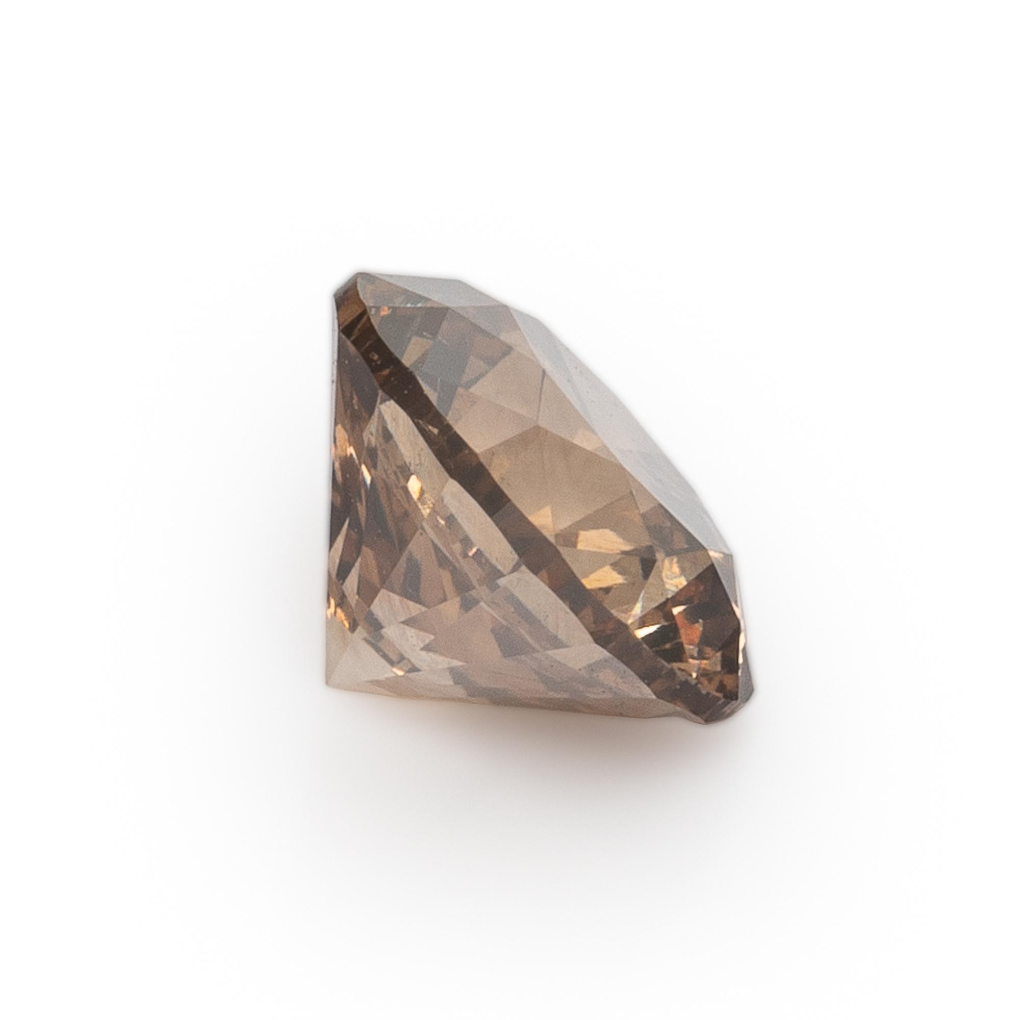 Pair of Fancy Dark Orange-Brown Diamonds