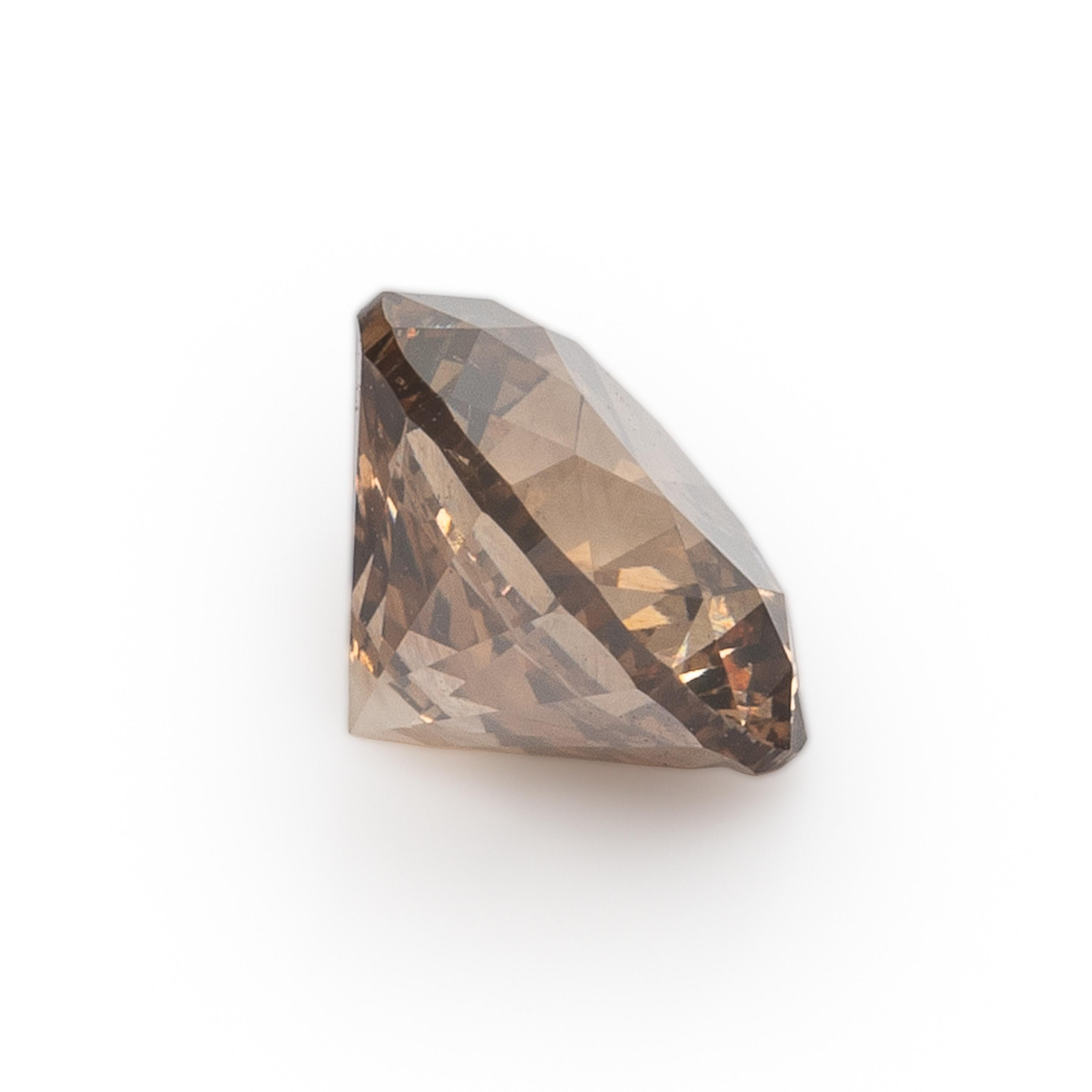 Pair of Fancy Dark Orange-Brown Diamonds