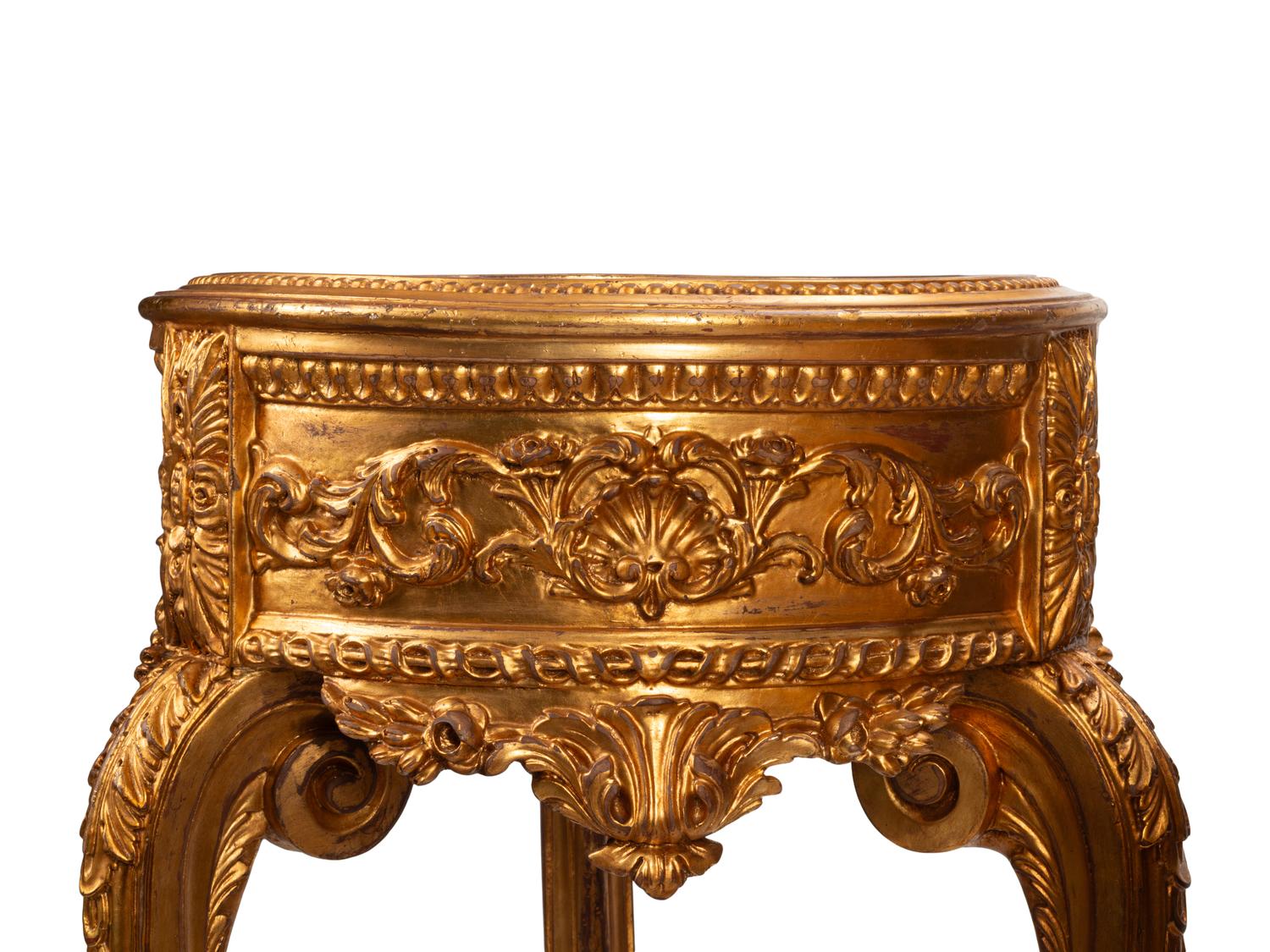 A Pair of Régence Style Giltwood Jardinière Stands