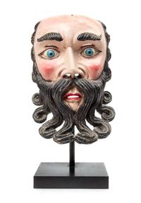 A Mexican Polychromed Wood Mask Height 11 1/2 inches.