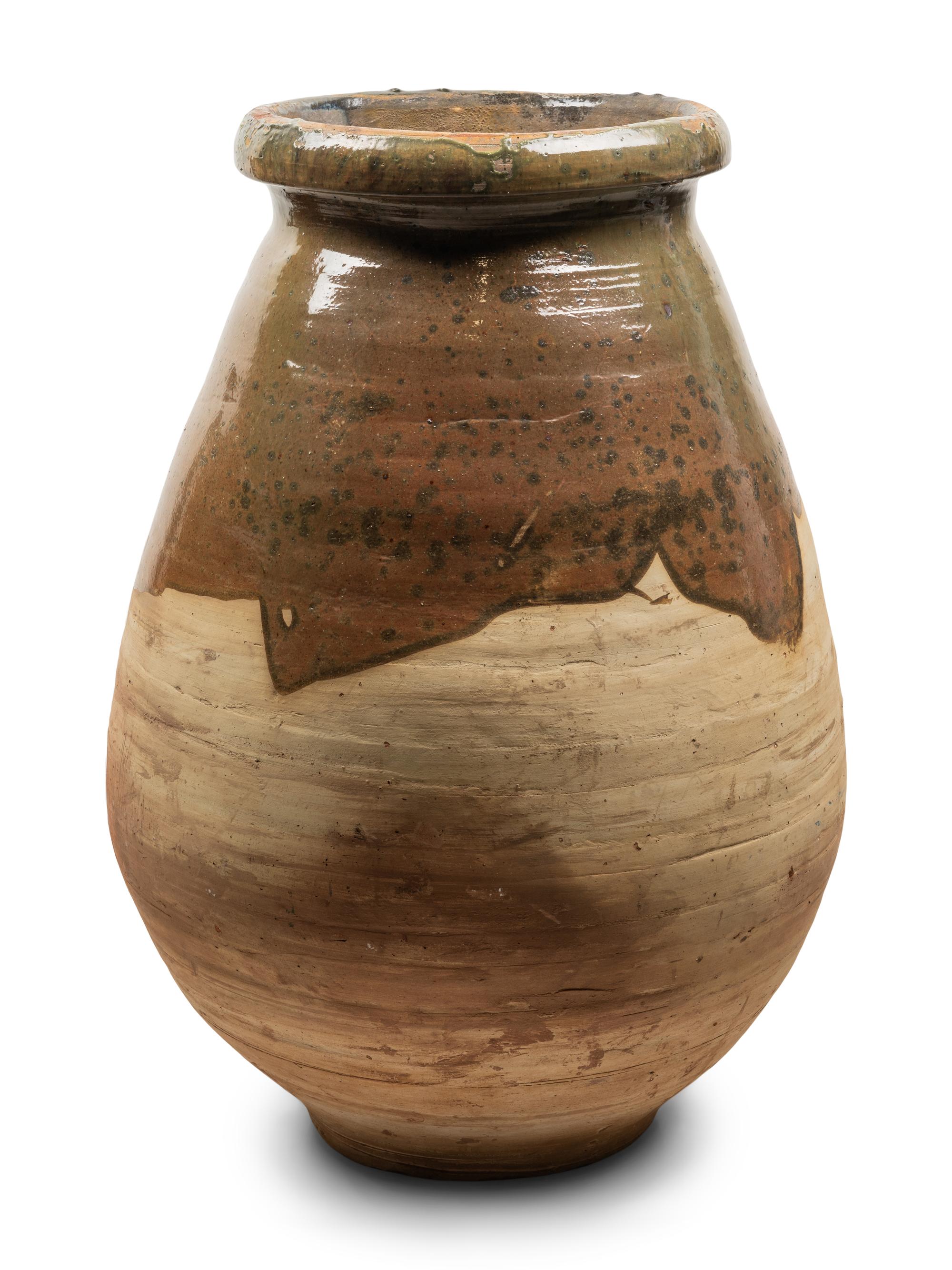 A Slip Glazed Pottery Storage Jar