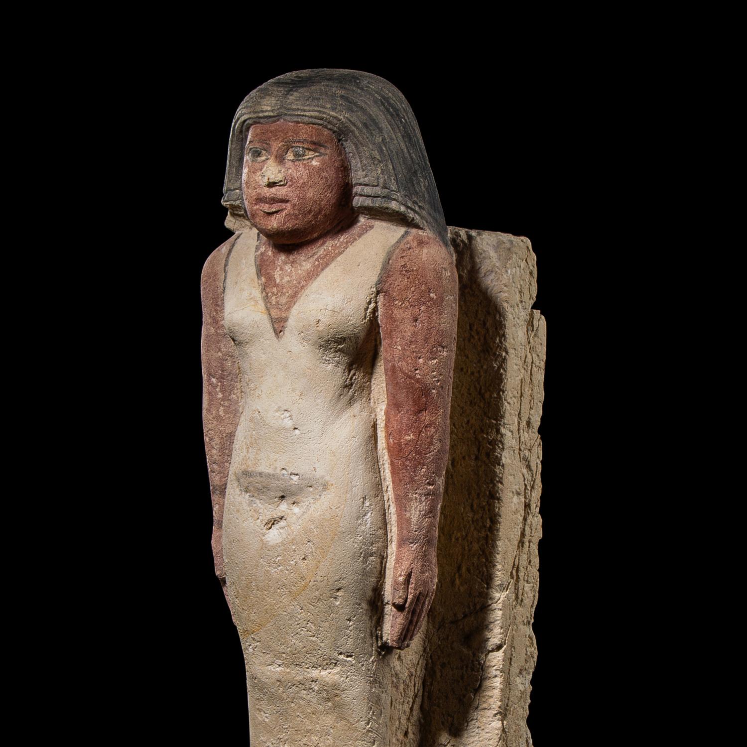 An Egyptian Painted Limestone Noblewoman