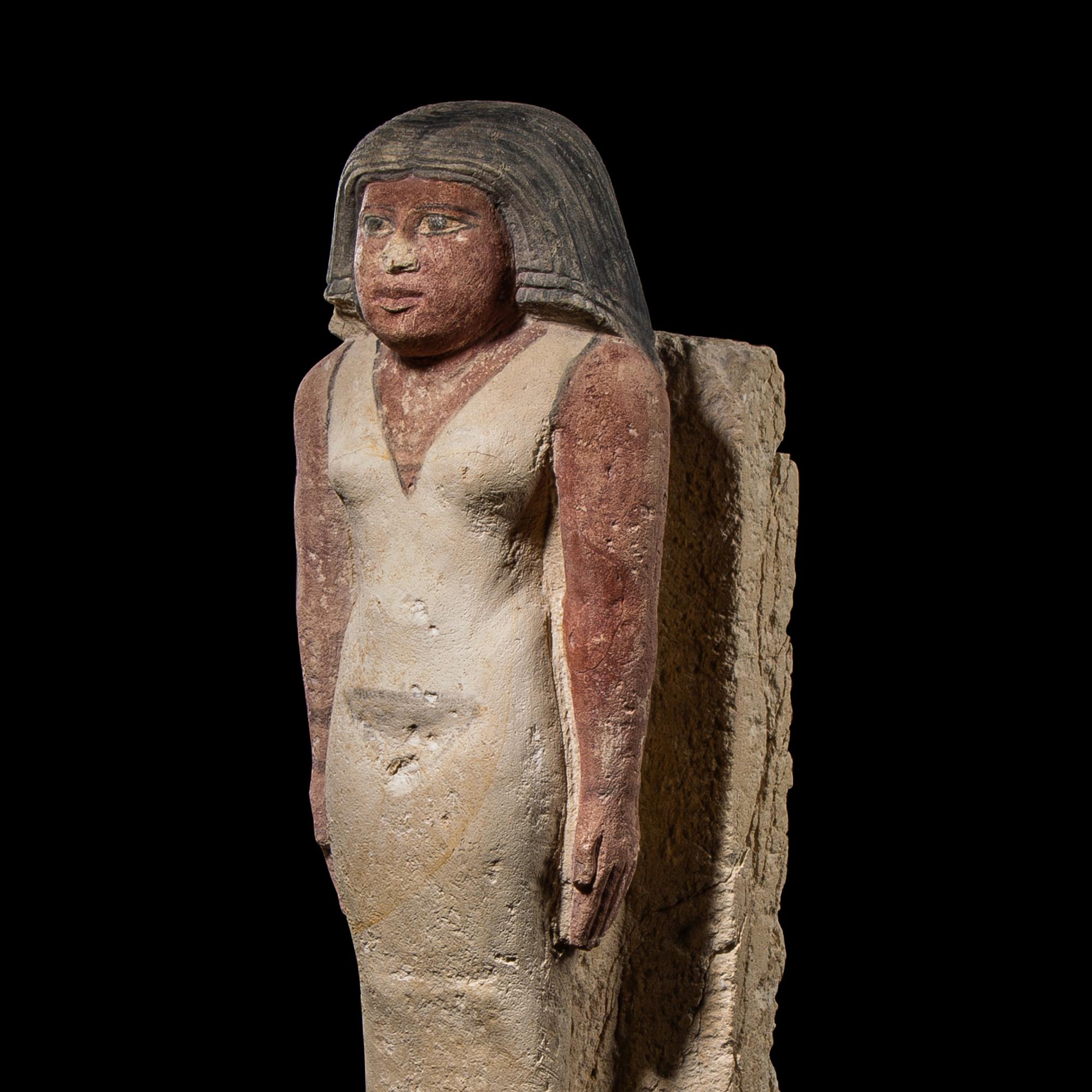 An Egyptian Painted Limestone Noblewoman