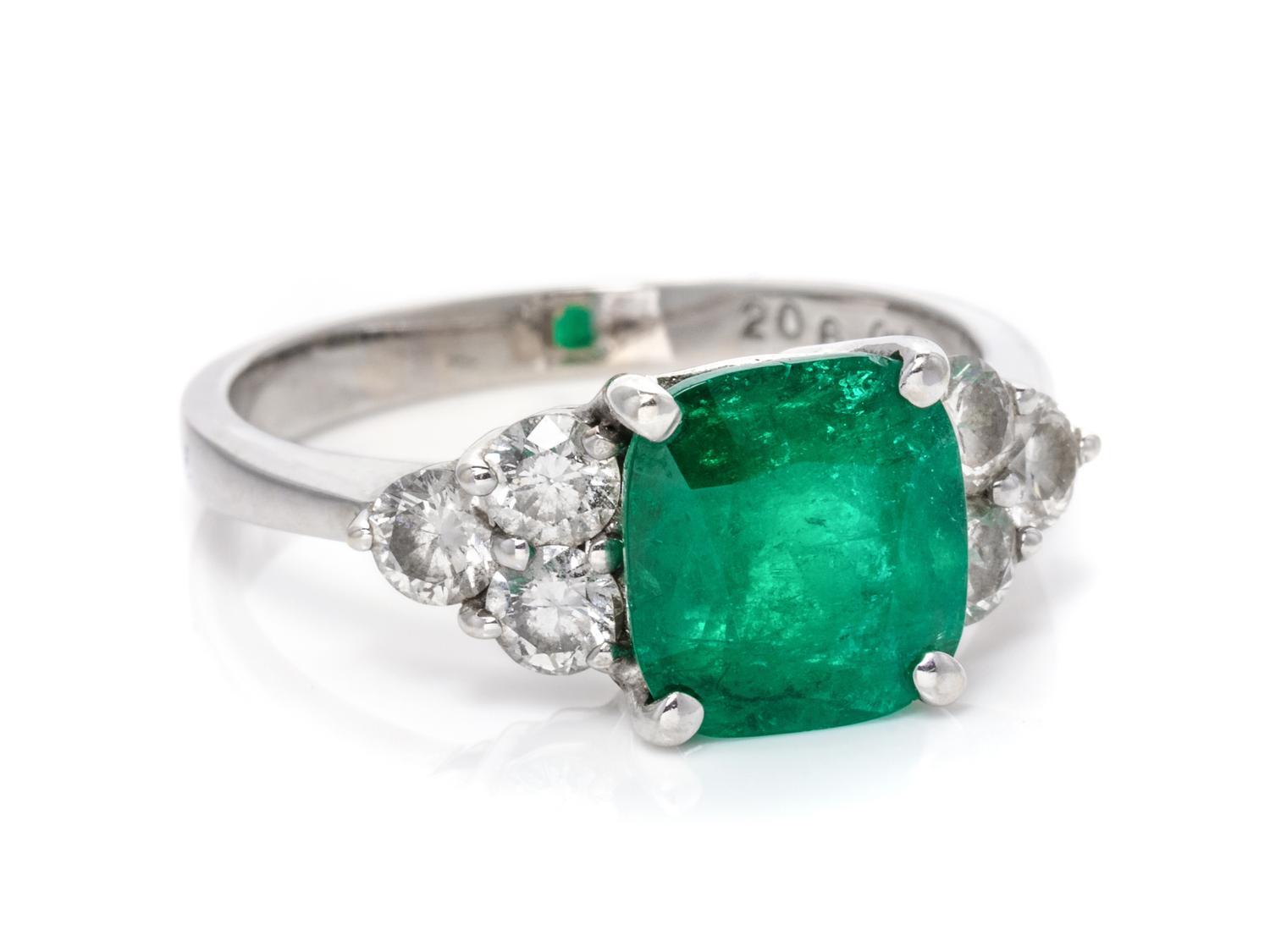 An 18 Karat White Gold, Emerald and Diamond Ring,