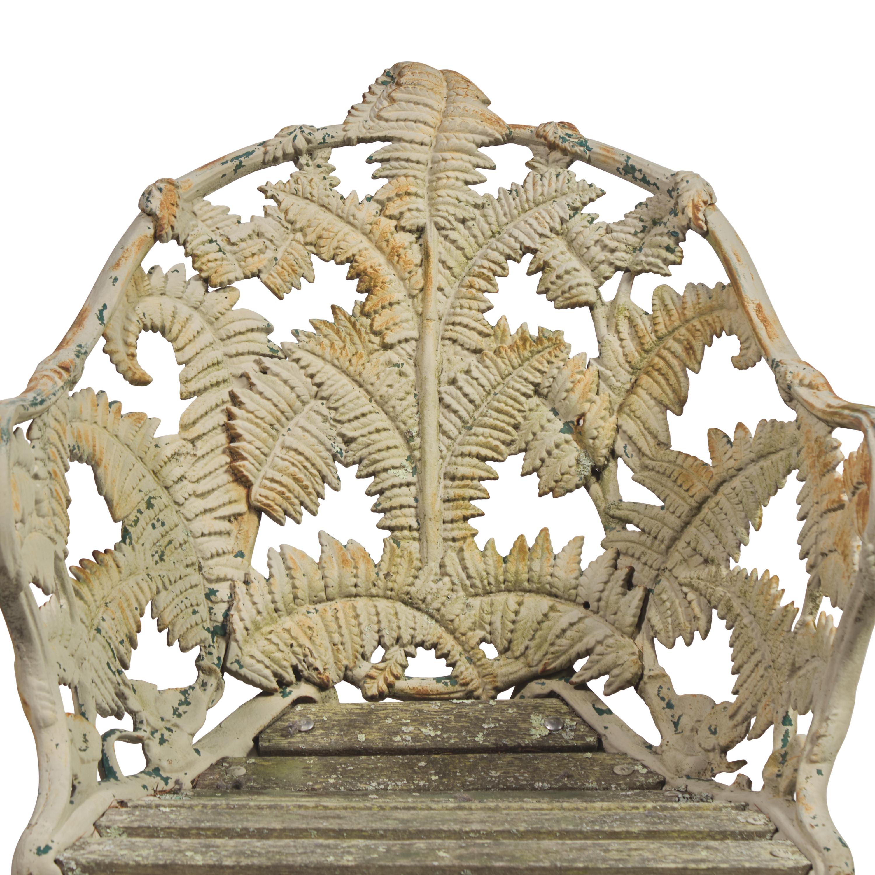 A Pair of Cast Iron Fern Pattern Garden Armchairs