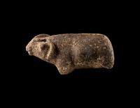 A Near Eastern Marble Figure of a Pregnant Mouflon
