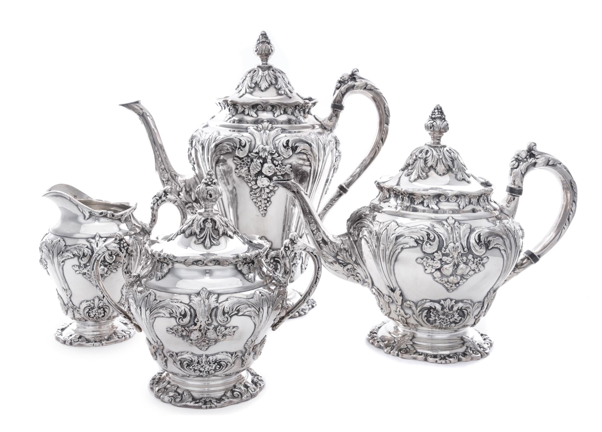 An American Silver-Plate Tea and Coffee Service, Reed & Barton, Taunton, MA, each with floral decoration.