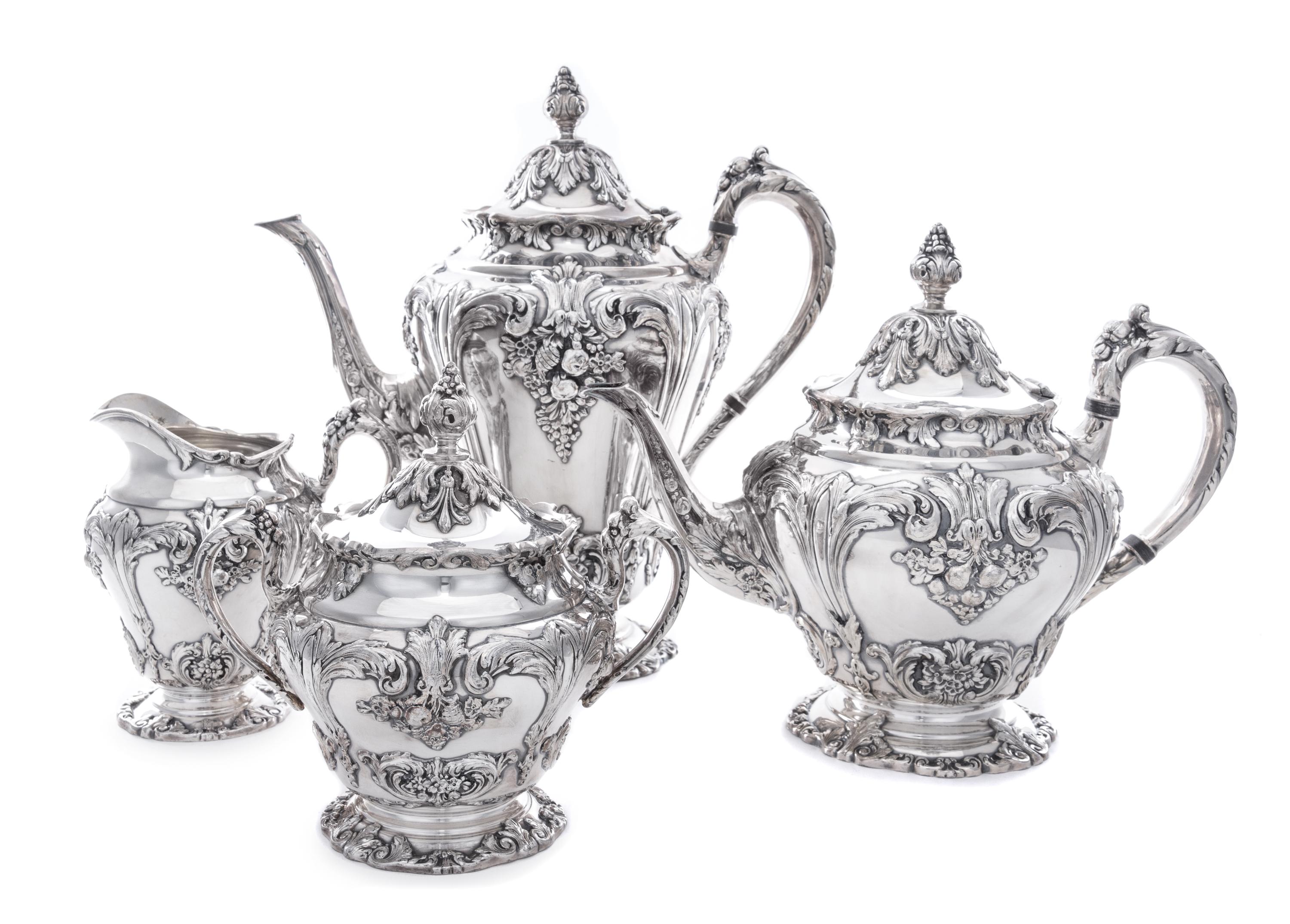 An American Silver-Plate Tea and Coffee Service, Reed & Barton, Taunton, MA, each with floral decoration.